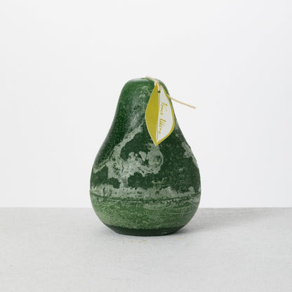 Timber Pear Candle 3 x 4 Inch, A green pear shaped candle with a textured surface stands tied with a small leaf shaped hang tag.