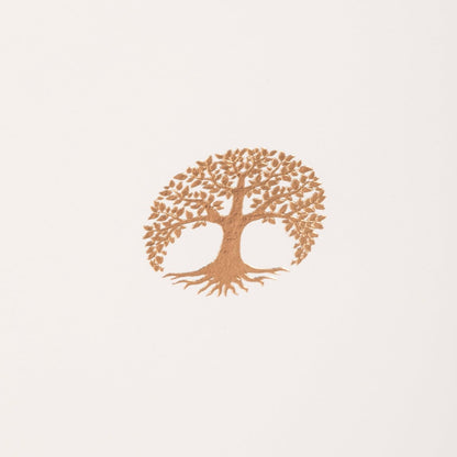 La Petite Presse Tree Boxed Notes, A cream notecard with a gold foil tree of life icon, tied with a bronze ribbon inside a teal box.