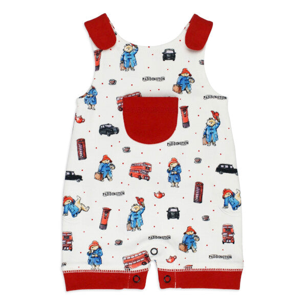 Organic Sleeveless Romper, London Paddington Print, A white sleeveless baby romper printed with Paddington Bear, red London buses, taxis, phone booths, and teapots, featuring a red front pocket and red trim.