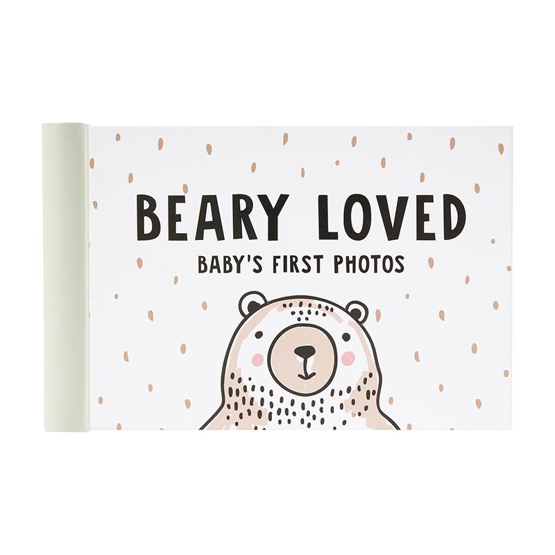 Woodland Adventure Baby Keepsake, The Woodland Adventure First Year Calendar cover is sage green with a white circle of a fox, a moose and a bear above the words Wild Little One's First Year Calendar.