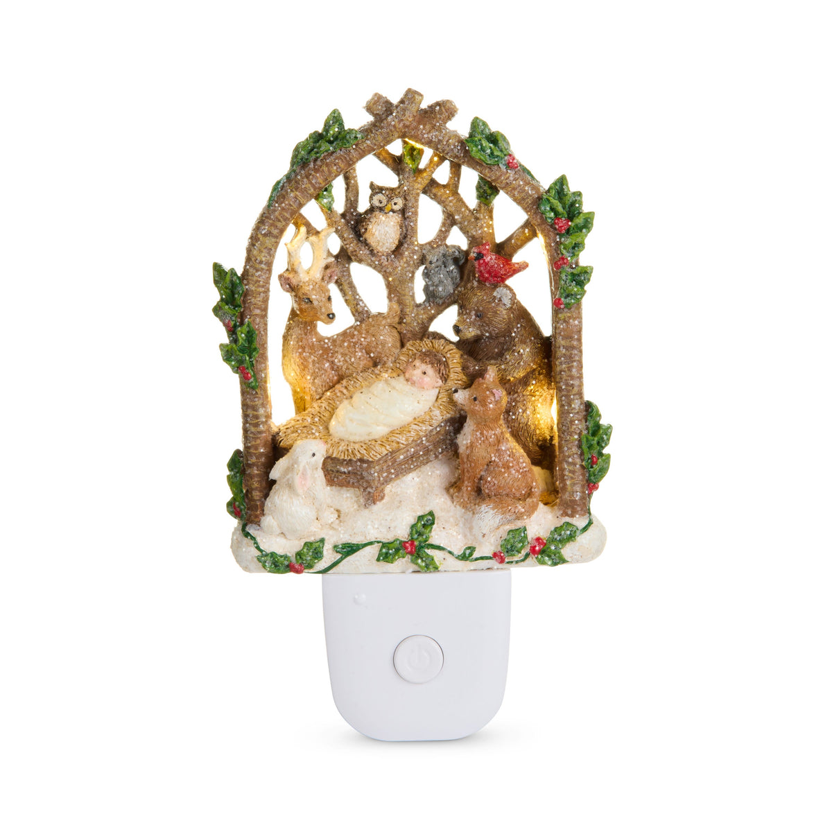 Woodland Animal Nativity Night Light, A resin night light showing a deer, fox, rabbit, owl and red cardinal around the baby in the manger beneath a twig arch trimmed with holly, on a snowy base.