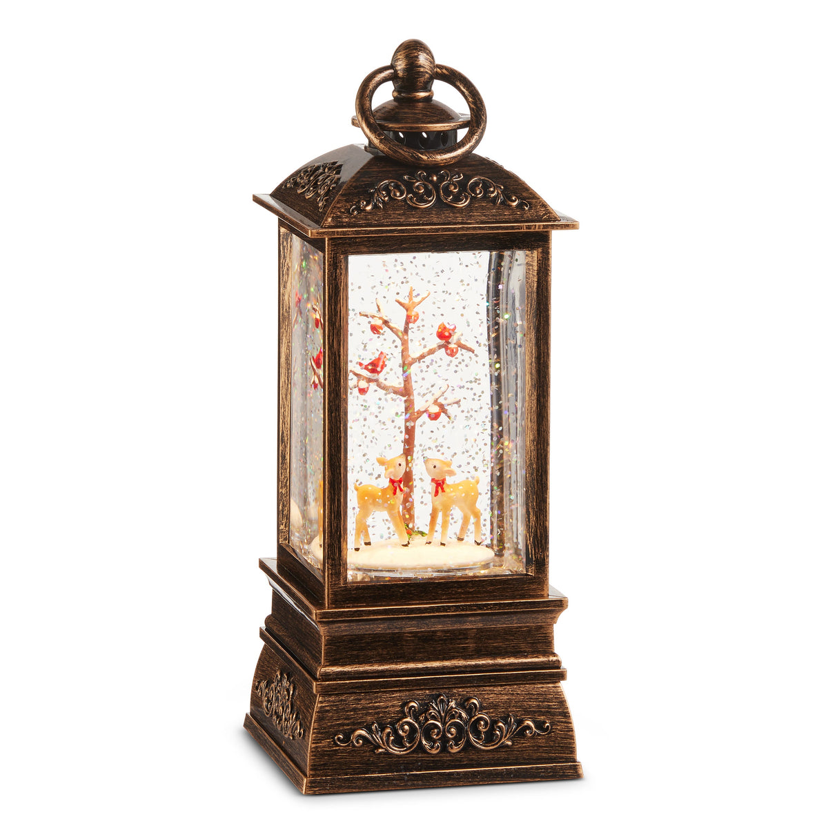 Woodland Deer Lighted Water Lantern, A bronze-toned square lantern with a ring handle showing two fawns with red bows beneath a snowy tree holding red cardinals, amid swirling glitter.