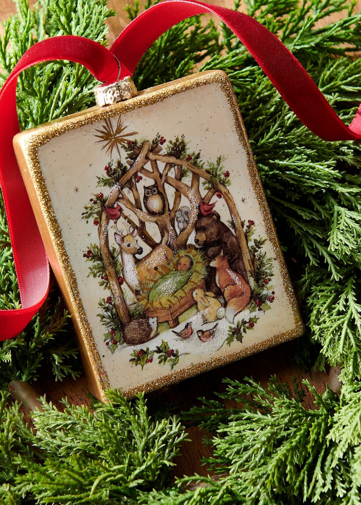 Woodland Nativity Rectangle Ornament, A rectangular glass ornament with a nativity scene surrounded by woodland animals including a deer, bear, fox and owl under a star.