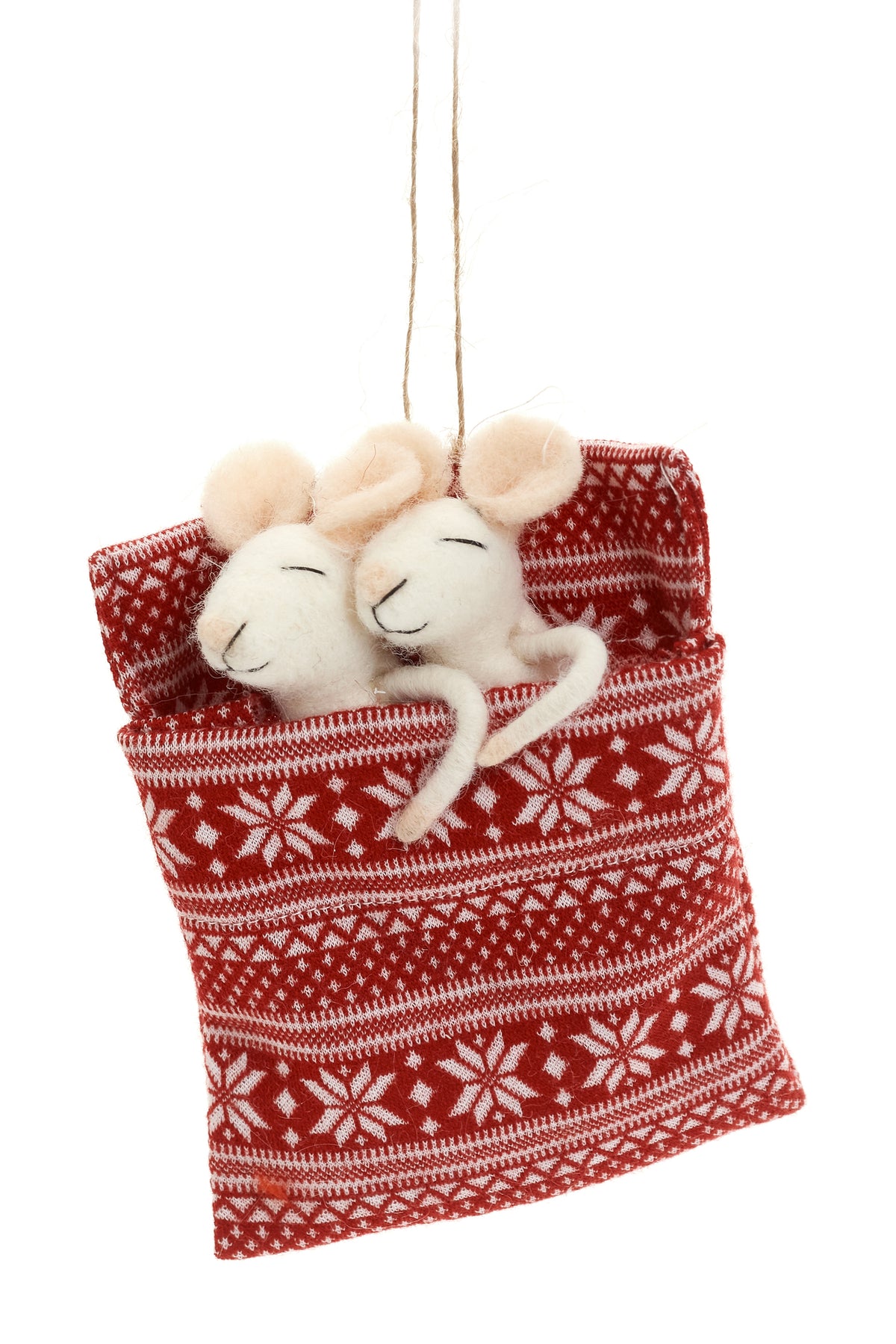 Wool Mice in Red Bed Ornament, The photo shows two white felted wool mice with peach ears tucked snugly into a red and white knit pouch patterned with snowflakes, hung from a jute loop.